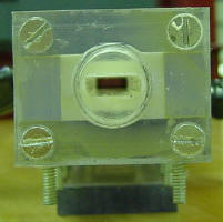 Back of the gun showing the 1" thick injector backplate which adapts a 3/4" thread to feed the 1/4" x 0.6" bore of the gun.