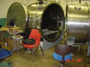 Frontal view of the open vaccum chamber. My work table is seen next to it.