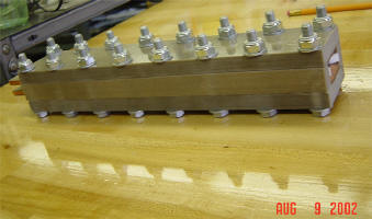 Rail Stack complete and bolted down. Notice that the 0.05" gap is gone; the Teflon spacers have been compressed in order to ensure a perfect seal between the rails.