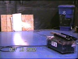 The front of the burning metal cloud starts to strike the projectile. It is two feet long approximately.